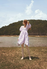 Silk mini dress with puff sleeves and ruched bodice for elegant summer and resort styling